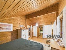 Schlafzimmer mit begehbarem Schrank OG Blockholzhaus Idylle mit Pool, Kamin & Sauna: Dein t�gliches Urlaubsgef�hl