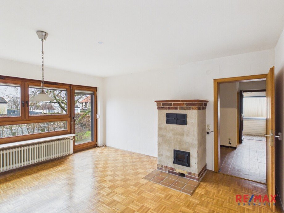 Wohnzimmer mit Kamin und Terrasse Einfamilienhaus Algermissen / L�hnde