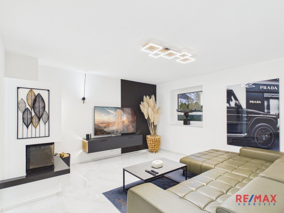 Wohnbereich mit Kamin Bungalow Hannover